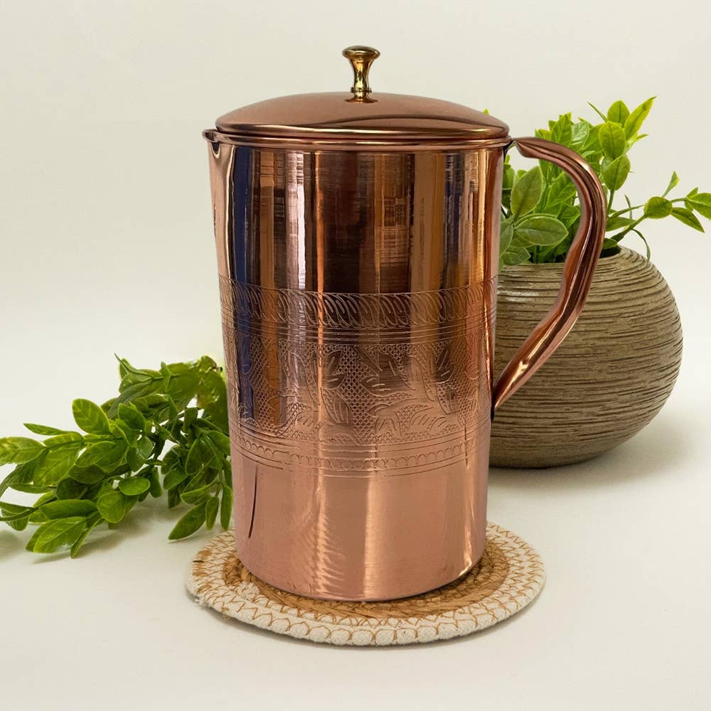 Pure copper jug with flower rim and lid ± 2 litres