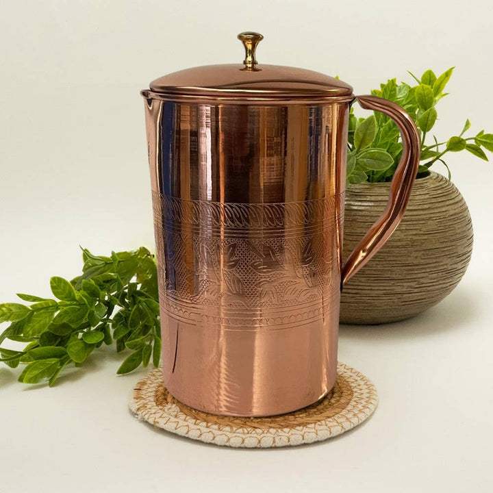 Pure copper jug with flower rim and lid ± 2 litres